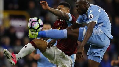 Stoke City's Bruno Martins Indi in action with Burnley's Andre Gray. Phil Noble / Reuters