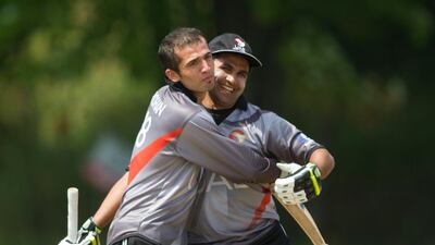 Mustafa, left, who himself scored an unbeaten 68 off just 61 deliveries, celebrated Shaiman's century with a nice hug at the end of the UAE innings. Their unbroken partnership had been worth 147 runs. Chris Young / The National