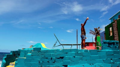 A man takes a selfie in the neighbourhood of La Perla. Ricardo Arduengo / AFP