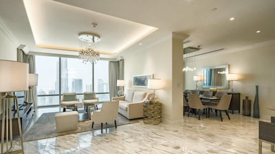 The living area is open plan but with a dividing wall.