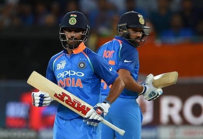 The legacies of Rohit Sharma, right, and Shikhar Dhawan remain mixed even though both players scored hundreds in their respective first Tests. AFP