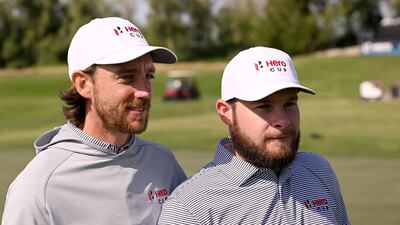Tommy Fleetwood and Tyrrell Hatton after winning on the 18th hole during the morning foursomes. Getty