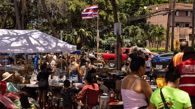 The state flag of Hawaii flies over a distribution centre for those affected by the Maui fires at Honokawai Beach Park in Napili-Honokowai, west Maui. AFP