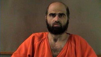 Nidal Hasan, charged with killing 13 people and wounding 31 in a November 2009 shooting spree at Fort Hood, is pictured in an undated handout photo obtained by Reuters on June 29, 2012. Reuters
