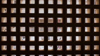 Looking out through square wind grills at the Al Shorafa Building in Bur Dubai. Pawan Singh / The National