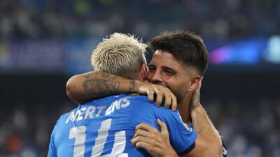 Napoli's Dries Mertens celebrates with teammate Lorenzo Insigne after converting a penalty. EPA