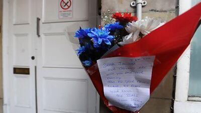 Flowers and a personal message of condolence outside the King Edward VII hospital apartments in memory Jacintha Saldanha.