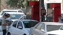Drivers queue at a petrol station to refuel in Tehran, on August 25, 2026. US Treasury Secretary Scott Bessent laid out plans for the "economic asphyxiation" of Iran, expanding Washington's secondary sanctions threats and warning of dire consequences for countries that do not join the campaign. The announcement comes almost six months into a war on Iran that has ground to a stalemate, with stalled peace talks and Tehran blocking most traffic through the crucial Strait of Hormuz. (Photo by AFP)