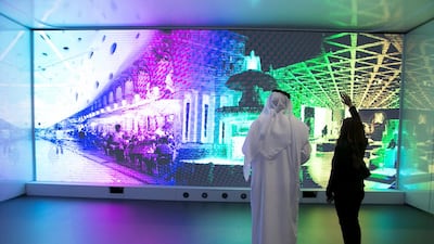 Above, an interactive display of Dubai Holding’s Mall of the World project. Reem Mohammed / The National