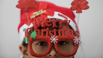 A student attends a virtual Christmas held by schools in Banda Aceh, Indonesia. EPA