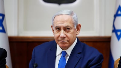 Israel's Prime Minister Benjamin Netanyahu attends the weekly cabinet meeting in Jerusalem. He is reaffirming his pledge to impose Israeli sovereignty on West Bank settlements. AP