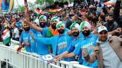 Despite rain interruptions, a packed crowd watched the Champions Trophy final last month. Andrew Yates / AFP