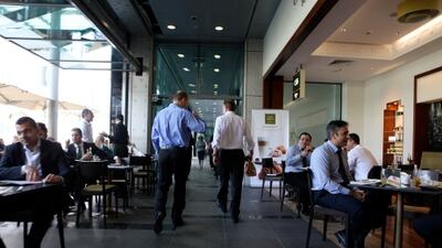 Workers across the Gulf are experiencing a "mid-life crisis" early in their careers, a new study shows. (Pawan Singh / The National)