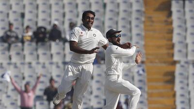Ravichandran Ashwin, left, now gives India the option of playing the extra bowler. He averages more than 34 with the bat, and less than 25 with the ball. Altaf Qadri / AP Photo