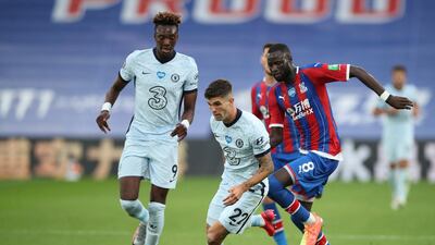 Chelsea's Christian Pulisic shakes off a challenge from Crystal Palace's Cheikhou Kouyate. AP