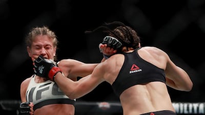 Karolina Kowalkiewicz of Poland, left, fights compatriot Joanna Jedrzejczyk in their women’s strawweight championship bout during the UFC 205 event at Madison Square Garden on November 12, 2016 in New York City. Jedrzejczyk won a unanimous decision after an epic five-round battle. Michael Reaves / Getty Images