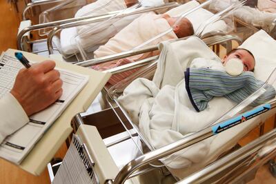 The age of a baby's father can have greater health implications than previously thought. AP Photo