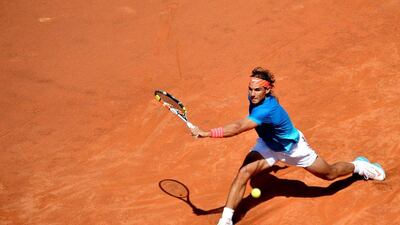 Rafael Nadal returns a shot to Marsel Ilhan during the Rome Masters last week. Tiziana Fabi / AFP / May 13, 2015