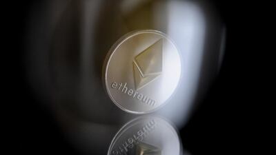 A replica "ether" cryptocurrency coin. Ether's value surged 30% on Sunday as cryptocurrencies surged. Getty Images
