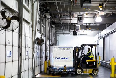 A worker drives a forklift at the American Airlines' cold storage facility, the largest facility for pharmaceutical products on the East Coast, that could soon be used to store coronavirus disease (COVID-19) vaccines at Philadelphia International Airport in Philadelphia, Pennsylvania, U.S., December 4, 2020. REUTERS/Rachel Wisniewski