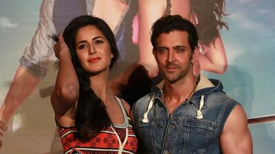 File photo of Bollywood actors Hrithik Roshan, right, and Katrina Kaif during the music launch of their film Bang Bang in Mumbai, India on Septermber 17, 2014. AP Photo/Rafiq Maqbool