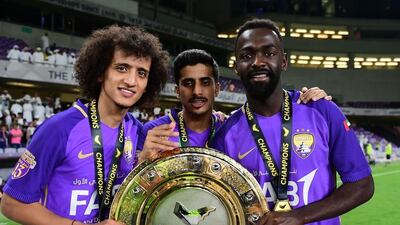 Omar Abdulrahman, left, has been pivotal to Al Ain's Arabian Gulf League title success this season and is set to stay at the club. Courtesy Al Ain FC