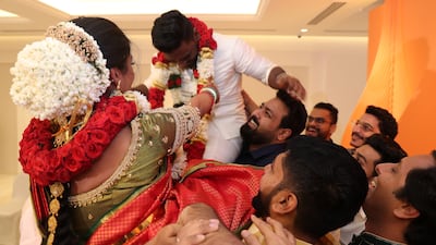 Exchanging more garlands at the end of the ceremony