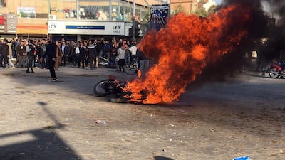 Iranian protesters clash in the streets following fuel price increase in the city of Asfahan, central Iran, earlier this week. EPA
