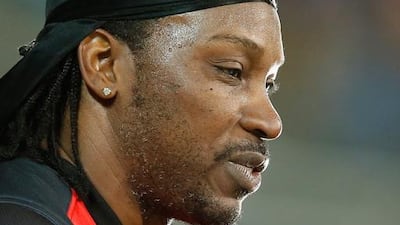 Chris Gayle of the Melbourne Renegades gives a TV interview to Mel Mclaughlin during the Big Bash League match between the Hobart Hurricanes and the Melbourne Renegades at Blundstone Arena on January 4, 2016 in Hobart, Australia. Darrian Traynor / Getty Images