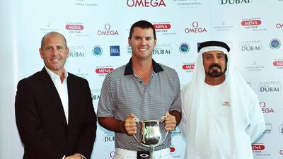 Cyril Suk, centre, with Mena tour chairman Mohamed Juma Buamaim, right, Al Badia Golf Club manager James Shippey, found joy in the final round of the Sheikh Maktoum Open, the tour’s fourth stop. Mena Golf Tour