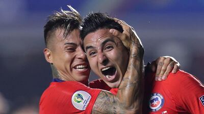 Chile's Erick Pulgar celebrates scoring their first goal with Eduardo Vargas. Reuters