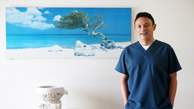 Dr Ahmed Amer, owner of Dental Spa, has an education fund for his daughters. Pawan Singh / The National