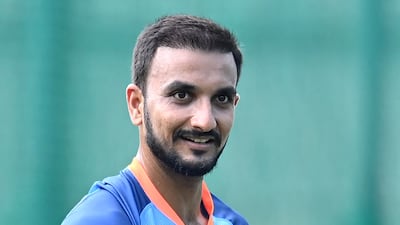 Seamer Harshal Patel prepares to bowl during practice. AFP