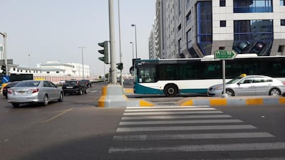The picture, taken by a reader, shows how drivers in Abu Dhabi continue to stop their vehicles in the middle of pedestrian crossings despite warnings that doing so could result in a fine of Dh500. Courtesy Iftekhar Ahmed