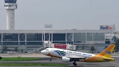 A Cebu Pacific plane takes off at the Ninoy Aquino International Airport in Manila. The airline has reported impressive increases in passenger numbers. Noel Celis / AFP