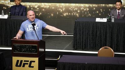 UFC president Dana White speaks beside an empty chair where Conor McGregor was supposed to sit during a news conference for UFC 200, Friday, April 22, 2016, in Las Vegas. John Locher / AP Photo