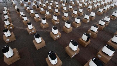 Rows of oxygen concentrators for COVID-19 patients sit in the main plaza of the Iztapalapa borough of Mexico City. AP Photo