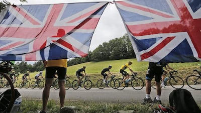 Chris Froome rides with the peloton on Thursday during Stage 18 of the 2015 Tour de France. Christophe Ena / AP