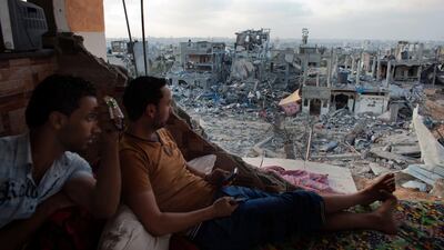 Palestinians overlook the Shejaiya neighbourhood of Gaza City, Gaza, where unemployment is at 44 per cent. Heidi Levine / Sipa Press