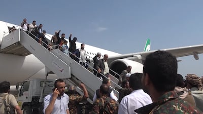 The Houthi delegation returning from Tehran arrive at Hodeidah Airport in western Yemen, after their flight was diverted from Sanaa Airport due to an attack. EPA