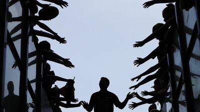 Jack Higgins of the Tigers is greeted by fans during the round one AFL match between the Carlton Blues and the Richmond Tigers at Melbourne Cricket Ground. Getty Images