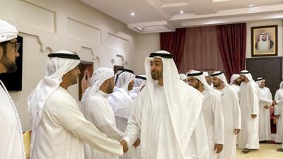 Sheikh Mohamed bin Zayed, Crown Prince of Abu Dhabi Deputy Supreme Commander of the UAE Armed Forces, offers condolences to the family of Mohammed Saeed Khalfan Al Mansoori at Majlis Al Wathba. Seen with Sheikh Hamdan bin Zayed, Ruler’s Representative in Al Dhafra Region (back 2nd R) and Sheikh Mohamed bin Hamad (back 3rd R). Rashed Al Mansoori / Crown Prince Court - Abu Dhabi