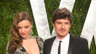 18. Miranda Kerr and Orlando Bloom. (Photo by ADRIAN SANCHEZ-GONZALEZ / AFP)