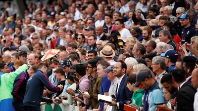 England celebrate winning the Cricket World Cup The Oval, London, Britain. England's Chris Woakes signs his autograph for fans during the celebrations. Reuters