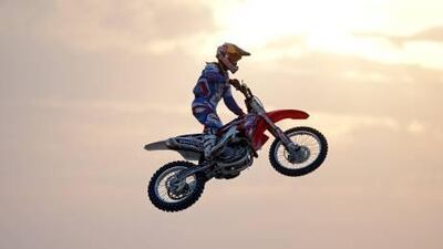 Freestyle motocross rider Lance Coury, on his Honda CRF 450cc during practice at Jumeirah Beach yesterday, aims to be the man who pleases the crowd most. Jeff Topping for The National