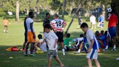 People play football at Safa Park in Jumeirah.
