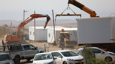 Construction work in illegal Israeli settlements. AFP