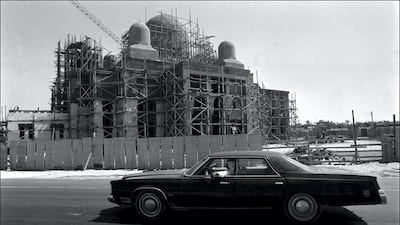 Jumeirah Mosque under construction in 1977 with an American 'gas-guzzler' flying past. American cars had become popular in Dubai during this time. Getty