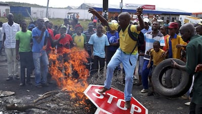 Protesters take part in a service delivery protest in Mabopane, in the North-west province, South Africa. Siphiwe Sibeko / Reuters