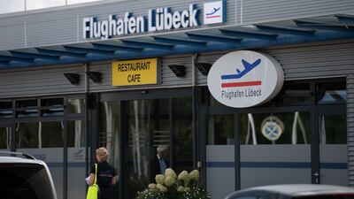Vaccinations were handed out at Luebeck Airport in northern Germany before police intervened. Getty